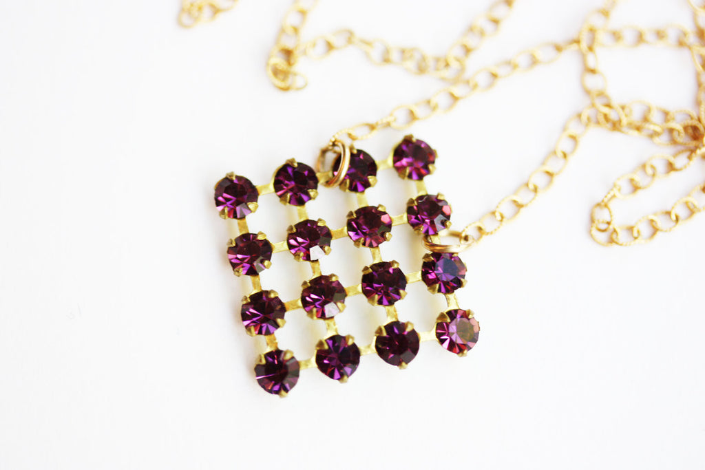 Purple and gold crystal necklace from Diament Jewelry, a gift shop in Washington, DC.