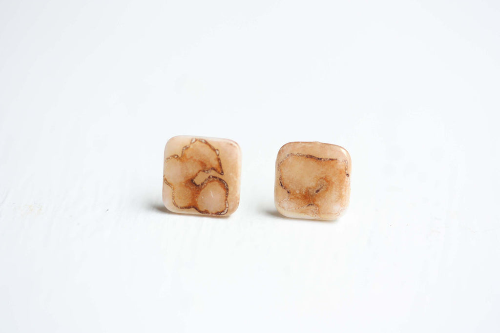 Tiny pebble studs from Diament Jewelry, a gift shop in Washington, DC.