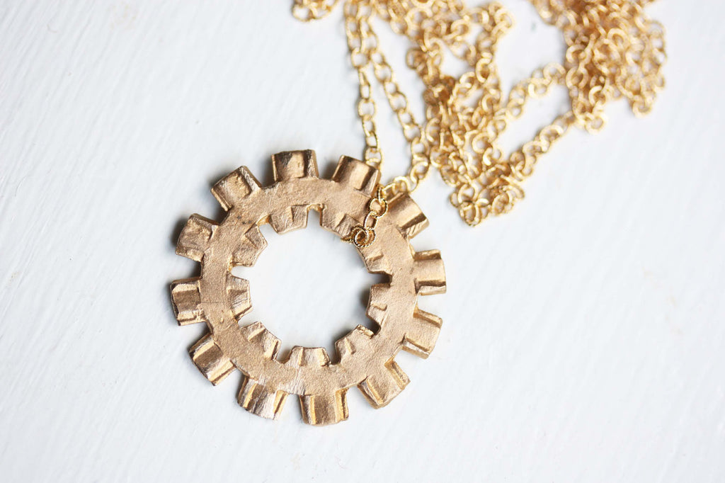 Gold spoke necklace from Diament Jewelry, a gift shop in Washington, DC.