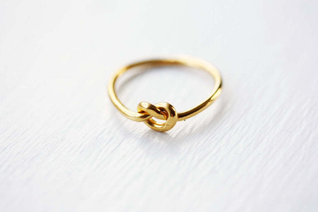 Gold knot ring from Diament Jewelry, a gift shop in Washington, DC.