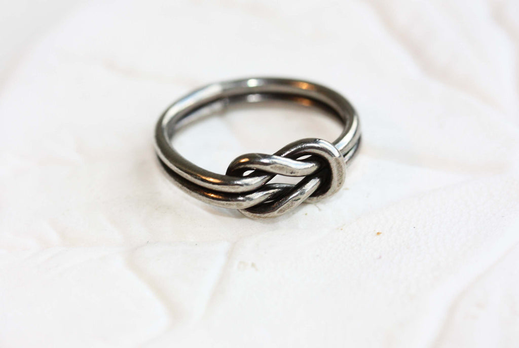 Silver sailor knot ring from Diament Jewelry, a gift shop in Washington, DC.