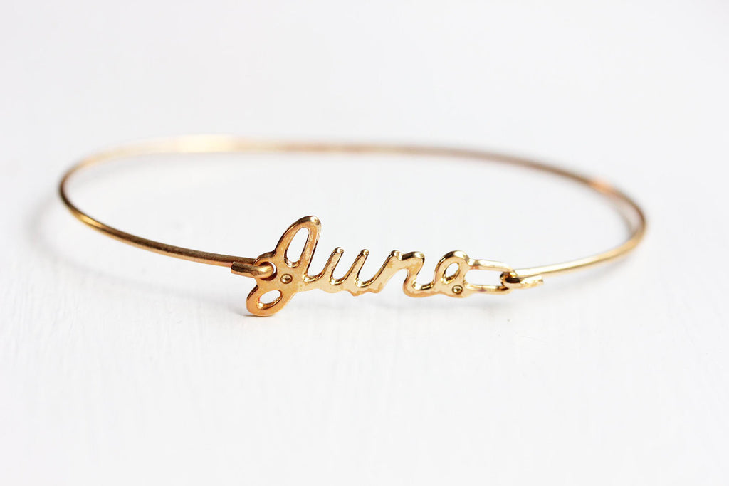 Vintage gold June name bracelet from Diament Jewelry, a gift shop in Washington, DC.