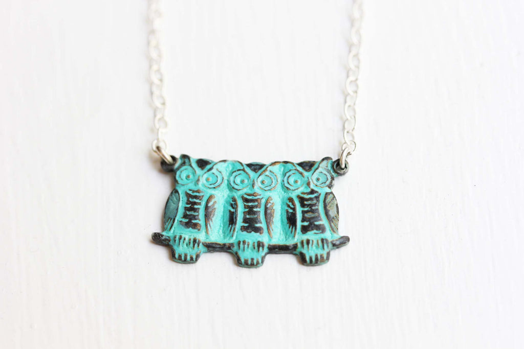 3 owls silver necklace from Diament Jewelry, a gift shop in Washington, DC.