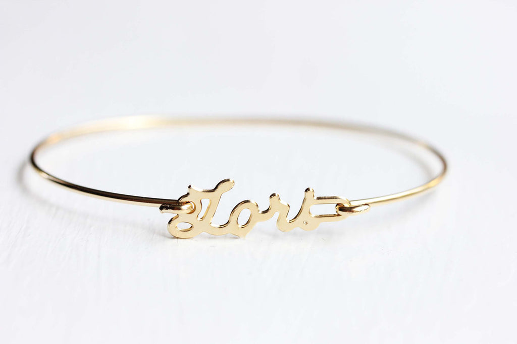 Vintage Lori gold name bracelet from Diament Jewelry, a gift shop in Washington, DC.