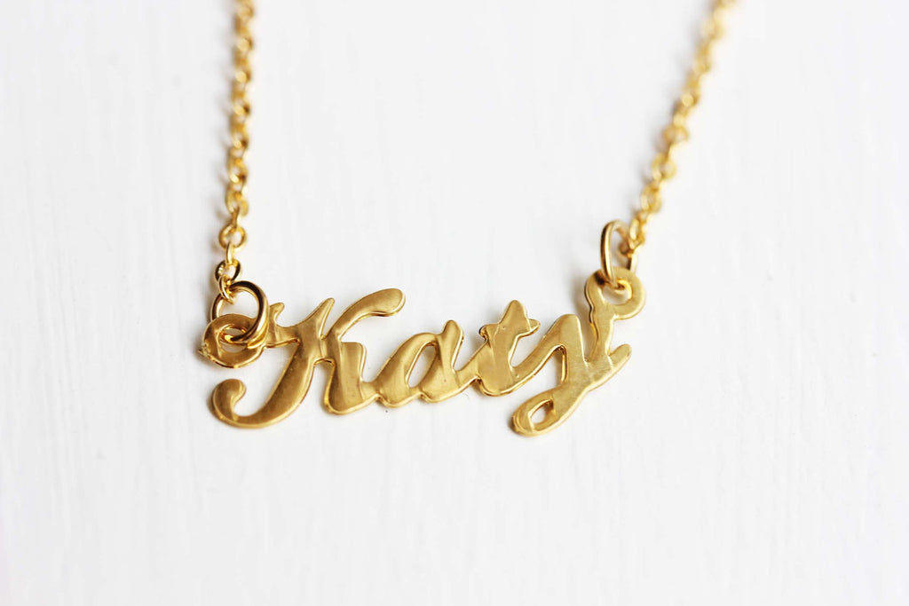 Vintage Katy gold name necklace from Diament Jewelry, a gift shop in Washington, DC.