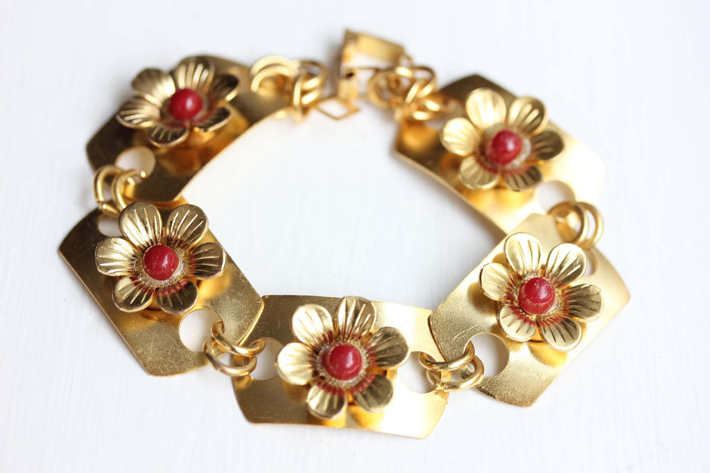 Red flower link bracelet from Diament Jewelry, a gift shop in Washington, DC.