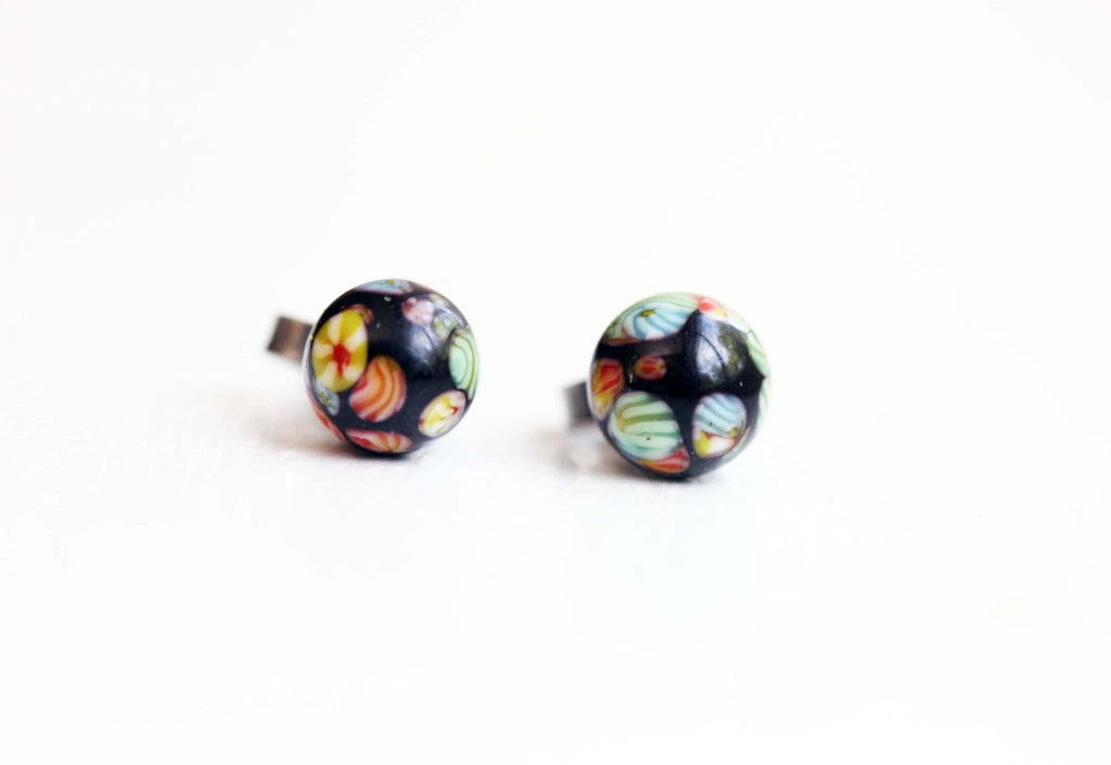 Vintage Japanese black confetti studs from Diament Jewelry, a gift shop in Washington, DC.