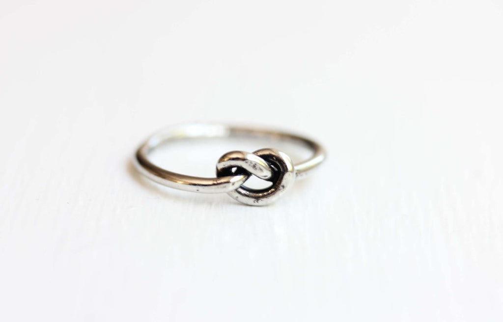 Silver sailor knot ring from Diament Jewelry, a gift shop in Washington, DC.