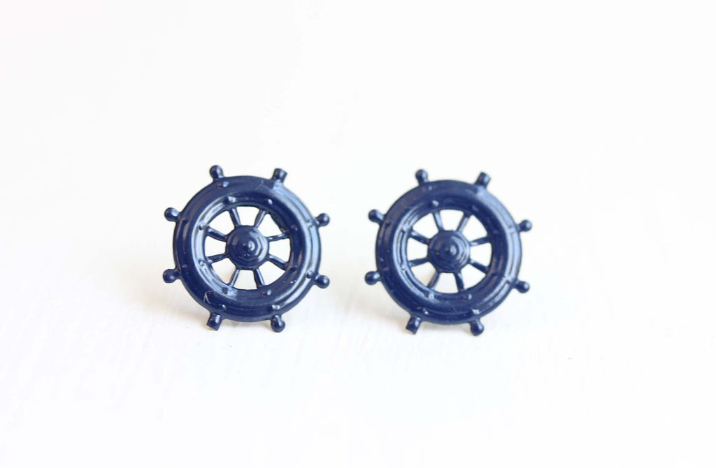 Navy ship wheel studs from Diament Jewelry, a gift shop in Washington, DC.