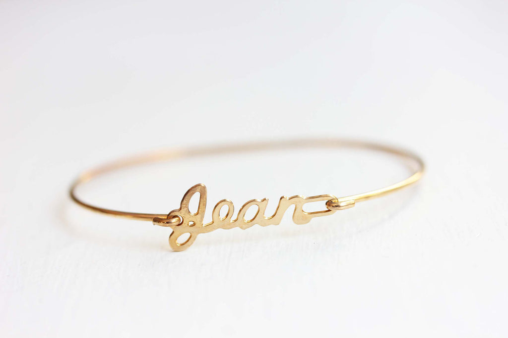 Vintage Jean Gold Name Bracelet from Diament Jewelry, a gift shop in Washington, DC.