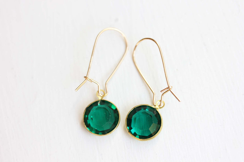 Vintage green swarovski crystal dangle earrings from Diament Jewelry, a gift shop in Washington, DC.