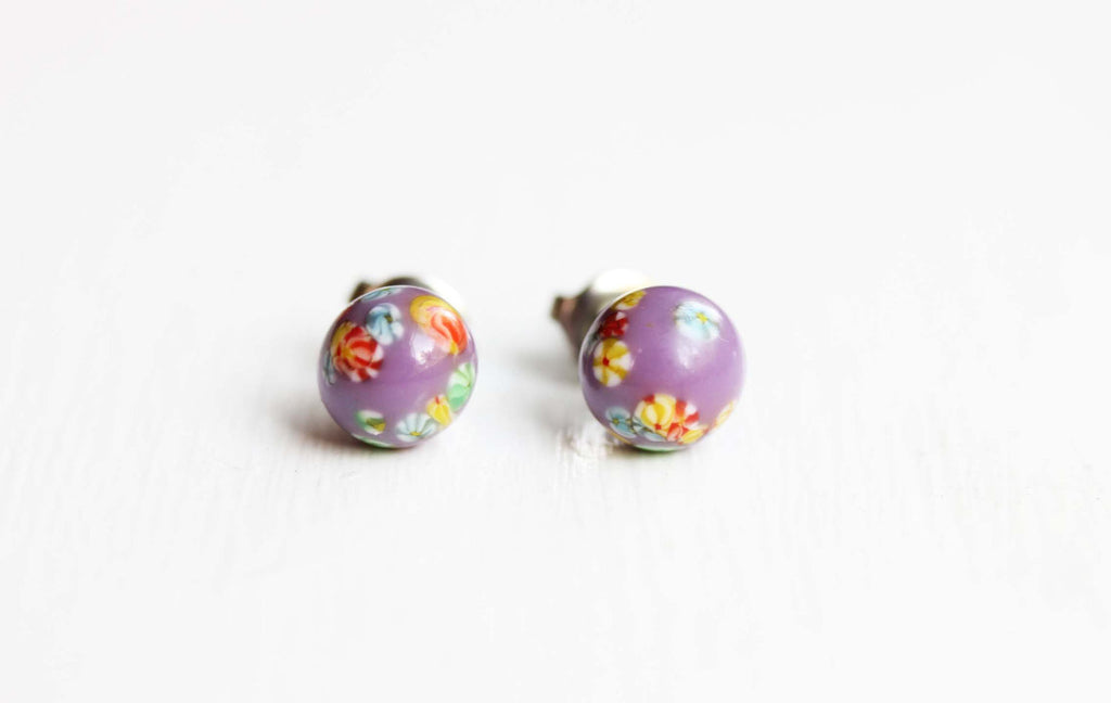 Vintage Japanese purple confetti studs from Diament Jewelry, a gift shop in Washington, DC.