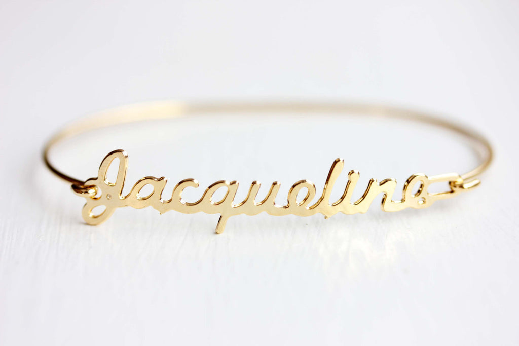 Vintage gold Jacqueline name bracelet from Diament Jewelry, a gift shop in Washington, DC.