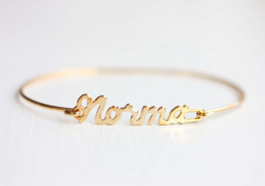 Vintage Norma gold name bracelet from Diament Jewelry, a gift shop in Washington, DC.