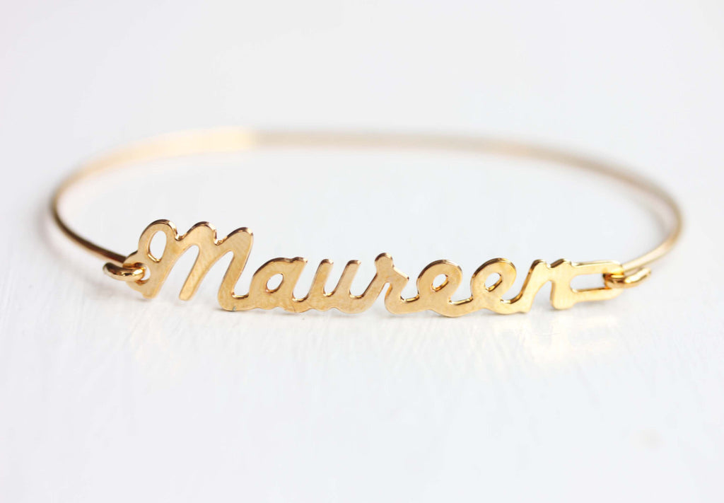 Vintage Maureen gold name bracelet from Diament Jewelry, a gift shop in Washington, DC.