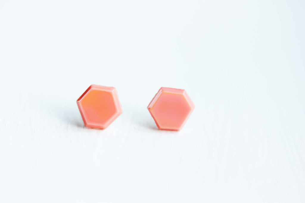 Coral hexagon studs from Diament Jewelry, a gift shop in Washington, DC.