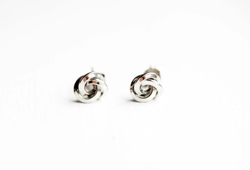 Silver knot studs from Diament Jewelry, a gift shop in Washington, DC.