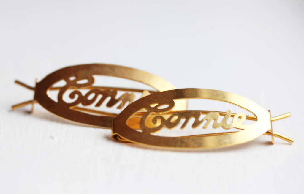 Vintage Connie gold hair clips from Diament Jewelry, a gift shop in Washington, DC.