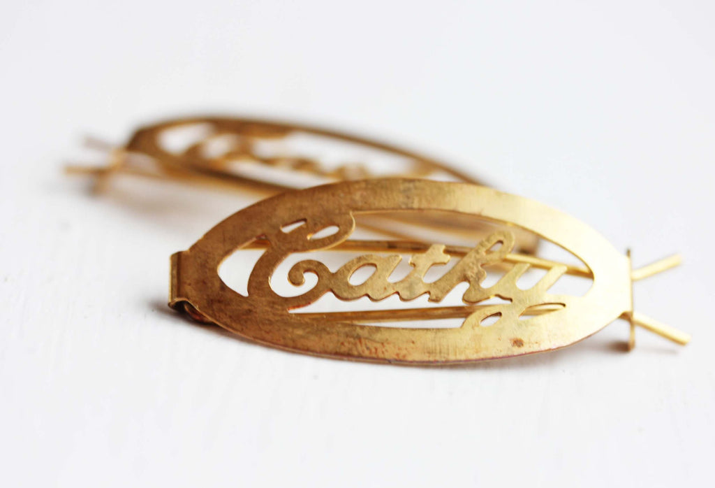 Vintage Cathy gold hair clips from Diament Jewelry, a gift shop in Washington, DC.