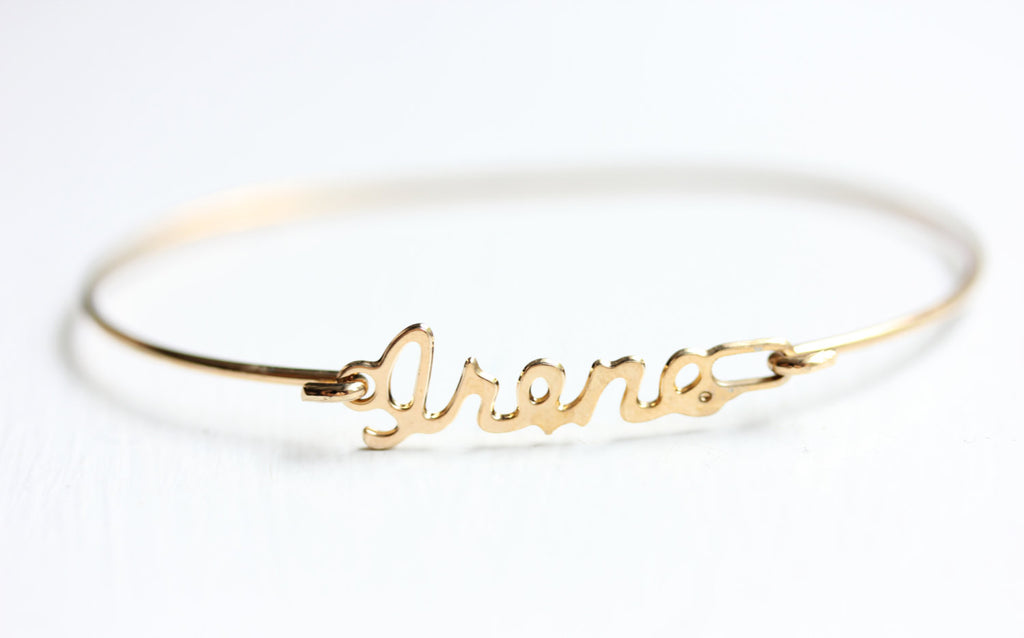 Vintage Irene Gold Name Bracelet from Diament Jewelry, a gift shop in Washington, DC.