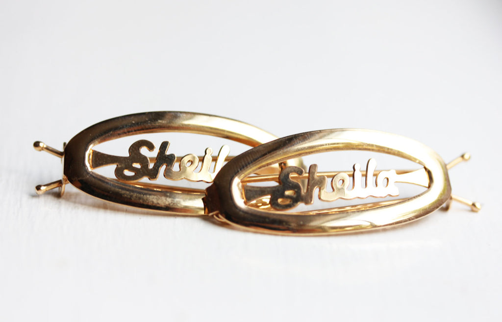 Vintage Sheila gold hair clips from Diament Jewelry, a gift shop in Washington, DC.