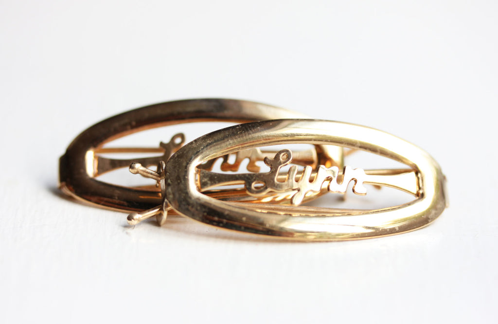 Vintage Lynn gold hair clips from Diament Jewelry, a gift shop in Washington, DC.