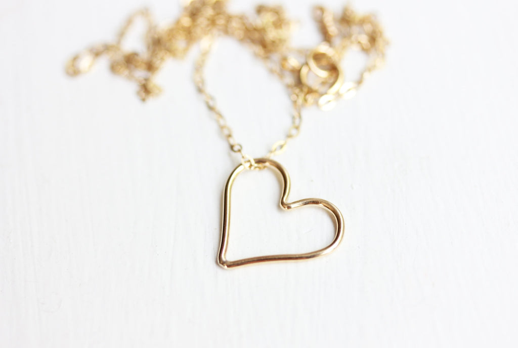 Sweet gold heart necklace from Diament Jewelry, a gift shop in Washington, DC.