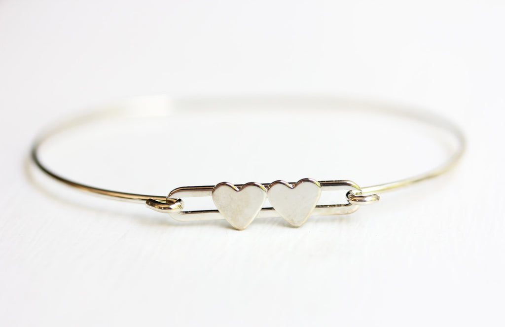 Silver double heart bracelet from Diament Jewelry, a gift shop in Washington, DC.