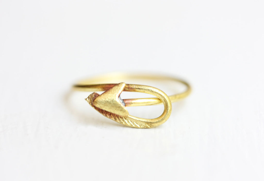 Gold Arrow Ring from Diament Jewelry, a gift shop in Washington, DC.