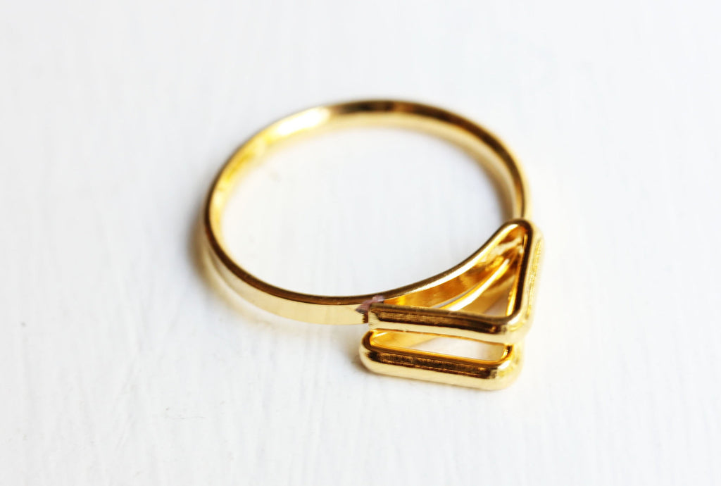 Pyramid Gold Triangle Ring from Diament Jewelry, a gift shop in Washington, DC.