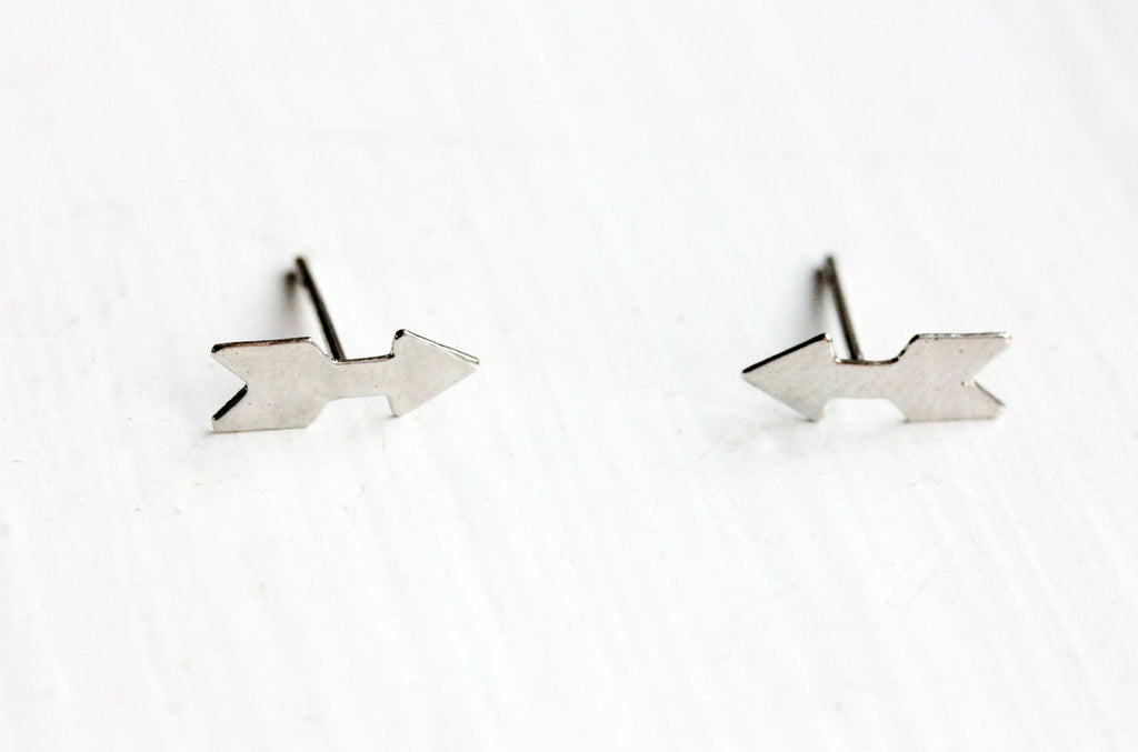 Tiny Silver Arrow Studs from Diament Jewelry, a gift shop in Washington, DC.