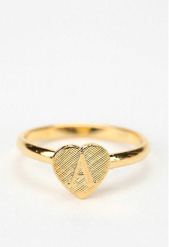 Vintage adjustable gold initial ring from Diament Jewelry, a gift shop in Washington, DC.